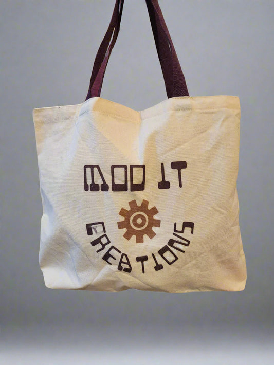 Tote bag with Mod It Creations and logo